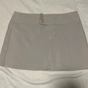 Jolt
Color: Tan
Type: Mini skirt
Size: 11